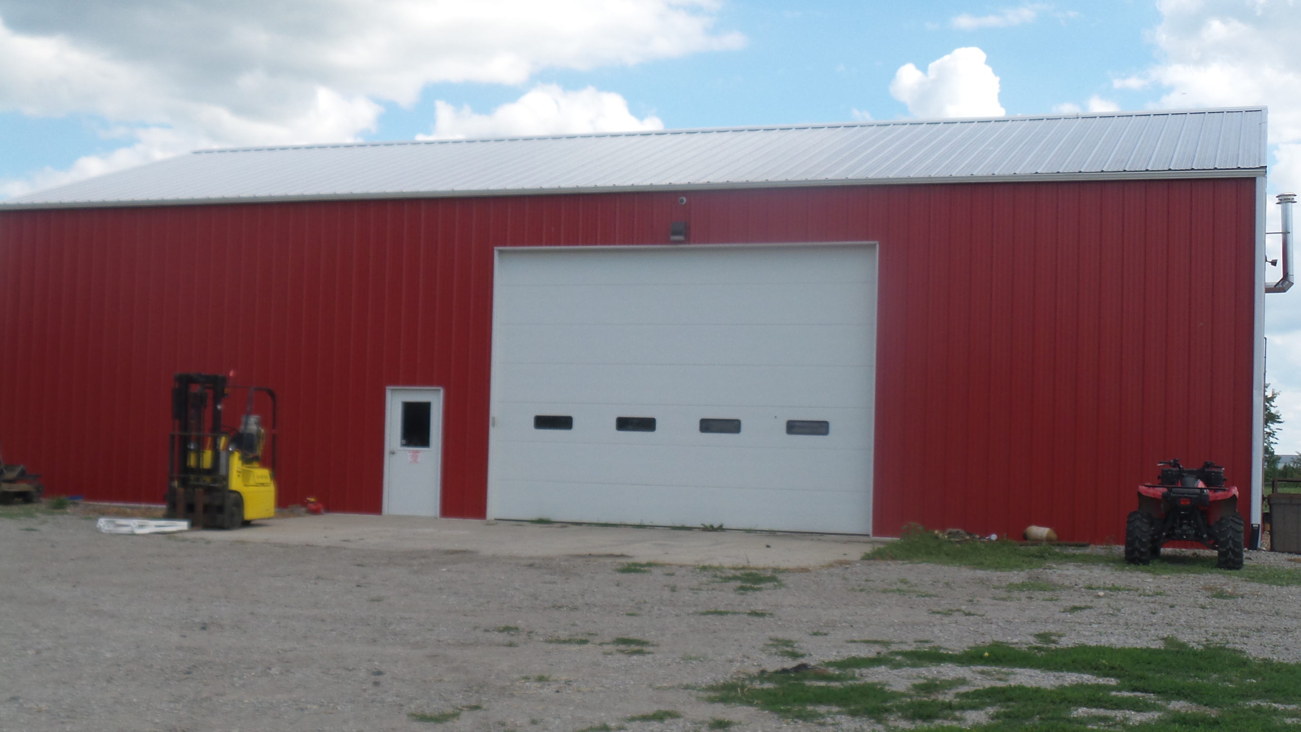 red barn showing security camera for business